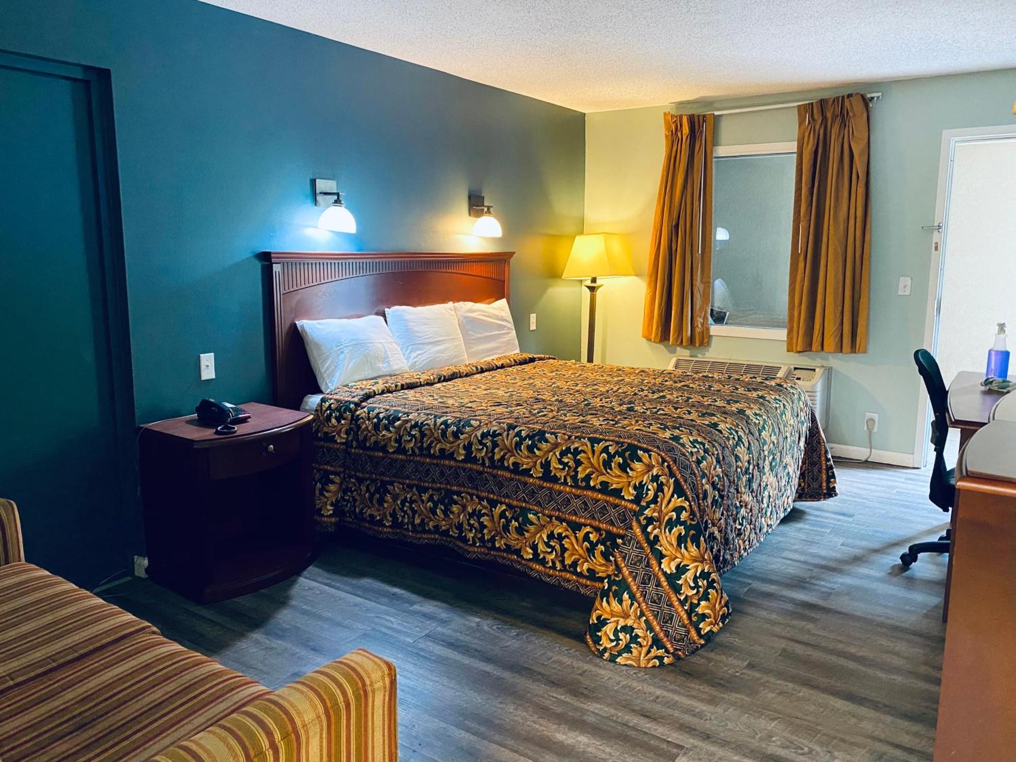 Excel Inn & Suites Фредеріксбург Номер фото